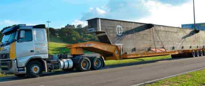 seguro-transporte-de-cargas-indivisíveis Cargas indivisíveis exemplos: na imagem, caminhão representa exemplo de carga indivisível e importância da contratação de um seguro para proteção